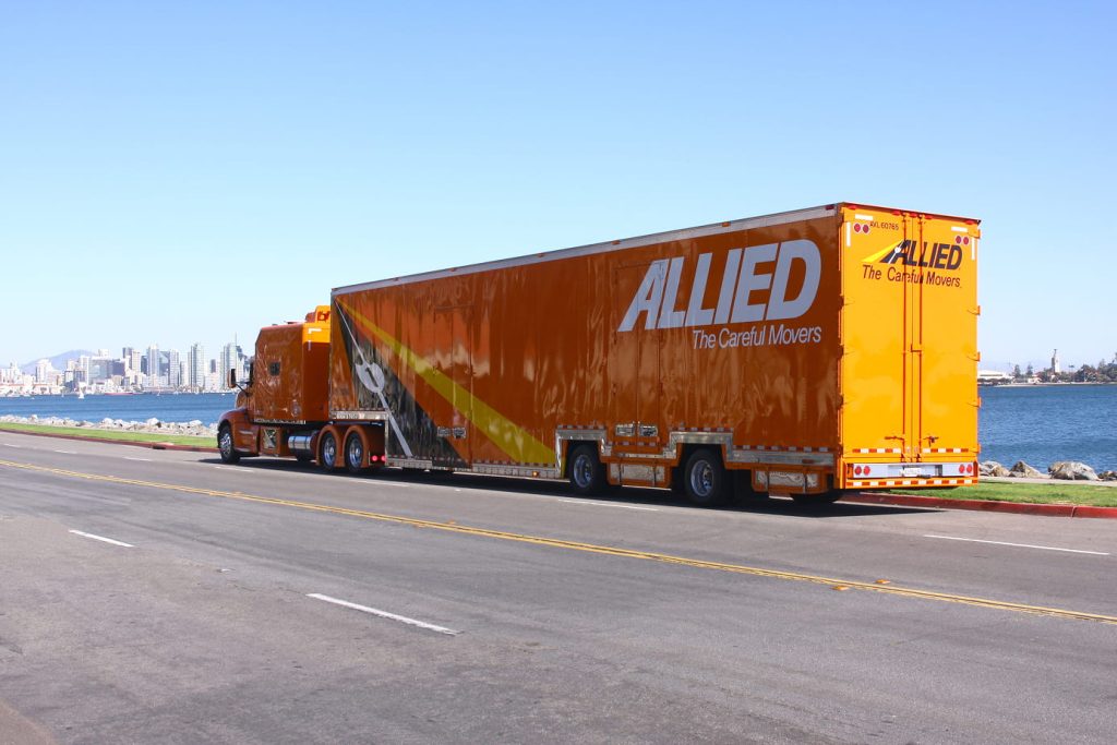 Interstate moving crew loading an Allied Van Lines trailer